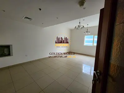 2BR apartment in Al Majaz 3, side view, parking, master room, 2 baths, built-in wardrobes, free AC, AED 58K, 4/6 cheques.