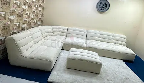 Beige color marina home corner sofa with ottoman