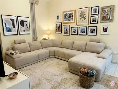 Soft fabric sofa with deep seating and plush cushions for ultimate comfort.