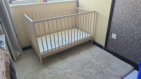 Wooden baby crib with mattress - good condition