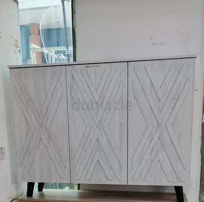 Whitewashed 3-door wooden cabinet