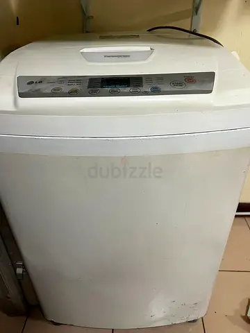LG TOP LOADING WASHING MACHINE