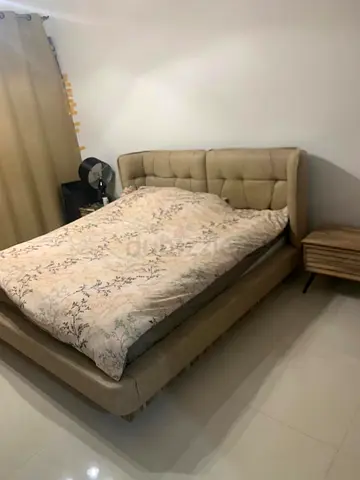 Comfortable King Size Bed with Nightstand