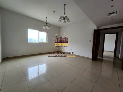 1BR apartment in Al Majaz 3, spacious layout, parking, built-in wardrobes, free AC, prime location, AED 48K, 4/6 cheques.