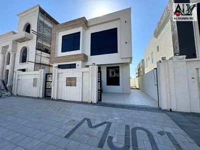 Villa for sale in Ajman | Al Helio 2 area | 5 bedrooms, majlis, 3 halls, maid's room and roof | Freehold | Price includes registration fees and is neg