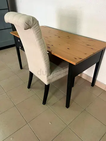 IKEA desk in black, made of solid pine wood.