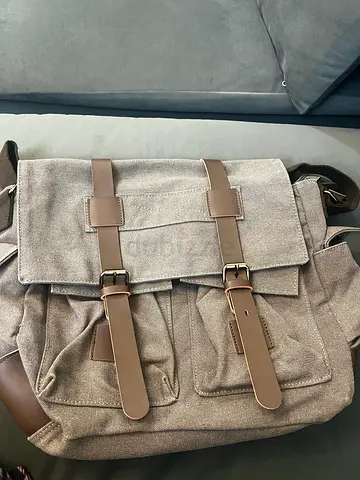Beige canvas backpack with leather straps — lightly used - Purchased from USA