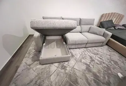 Eskilstuna light grey L shape sofa bed