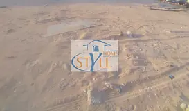 Land for sale in Sharjah, commercial/residential permit, in Al Majaz area, area 3850 sq ft