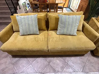 Im selling my Crate  Barrel (mustard 4 + 2) seater sofa with cushions - gently used