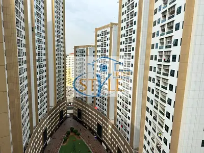 For sale: Two bedrooms and a living room in Pearl Towers Rashidiya 1, 1312 feet, 3 bathrooms and a balcony, parking, high floor, two views, AED 450,00