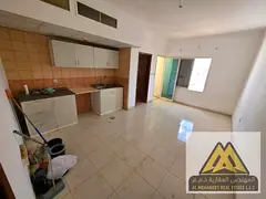 Studio apartment for annual rent in Al Rawda 1, Ajman. Spacious with balcony and excellent view. Cen