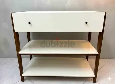 West Elm Modern Open Changing Table in a white and wood finish