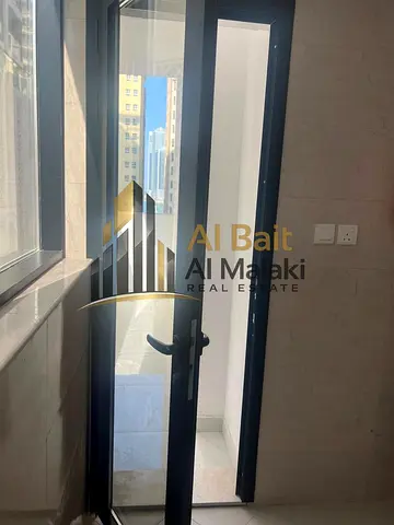 One bedroom and living room in Al Taawun, first occupancy, with free parking and balcony