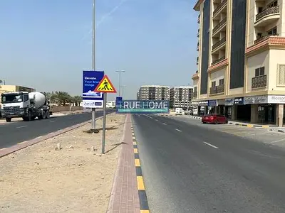 Corner Plot for Sale in Al Muwaileh – Near University | G+7 Approved