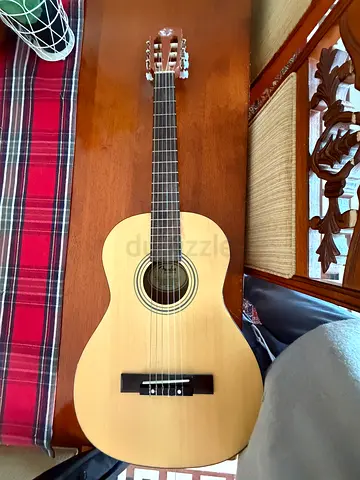 Classical acoustic guitar comes with bag