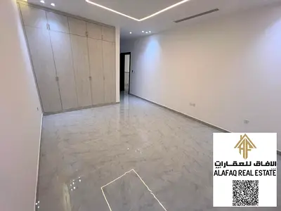 Brand new villa for rent in Al Helio 2, first tenant, modern design with high-end finishes, 5 bedrooms, majlis, hall, central AC, prime location near