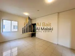 Large studio for rent in Al Majra with a separate kitchen.