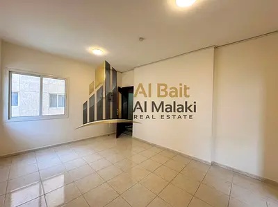 Large studio for rent in Al Majra with a separate kitchen.