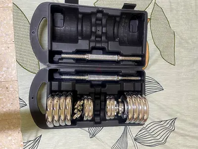 Adjustable chrome dumbbell set with case (used)