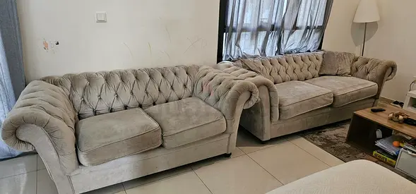 Elegant Cream Chesterfield Sofas