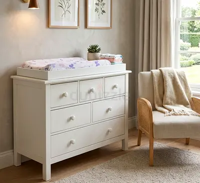 Pottery Barn Kids Kendall Nursery Dresser with a removable changing topper