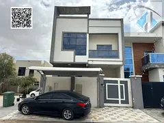 Townhouse for sale in Al Yasmin, behind Al Hamidiya Park. Freehold ownership. All utilities included