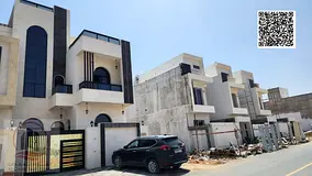 Villa for sale in Al Helio area, Ajman. Modern design, ground floor, first floor, and roof (4 maste