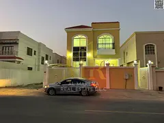 Villa for sale on a street and alley in Al Rawda 2 area, Ajman. Modern design. The villa's price