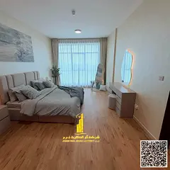 Luxury apartment with a sea view, brand new, two bedrooms, living room, and balcony for monthly rent