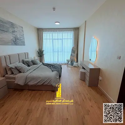 Luxury apartment with a sea view, brand new, two bedrooms, living room, and balcony for monthly rent. Ajman Corniche, Residence Towers.