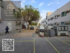 Prime Investment Opportunity – Labor Camp with Shops for Sale in Al Jurf, Ajman | High Rental Inco
