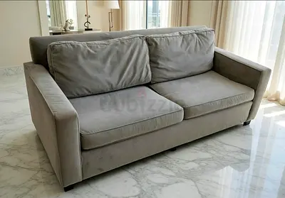 Looks new West elm two seater sofa bed with mattress