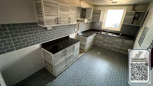 Beautiful room and living room, large area, 2 bathrooms, laundry room, large separate lounge, Al Jurf 2, on Sheikh Ammar Street, Dubai and Sharjah exi