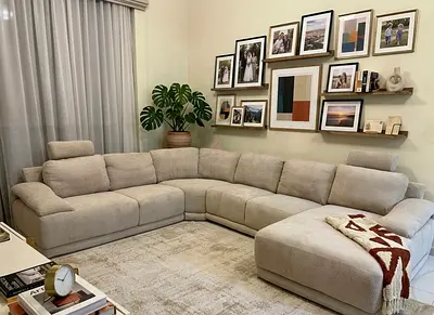 High-quality fabric sectional sofa with neutral color tone, easy to match with any interior décor.