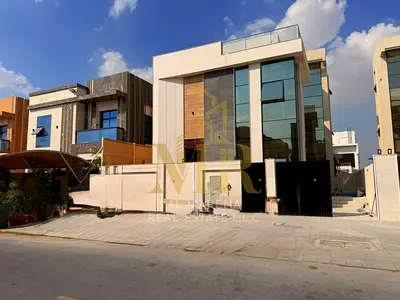 For Sale: Luxurious 7-Bedroom Villa with Rooftop Terrace, Electricity and Water Included, in Al Yasmin, Ajman. Prime Location, Freehold Ownership, Ban
