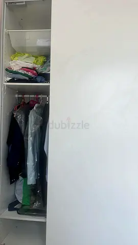 White 2-door  sliding wardrobe with built-in shelves - excellent condition