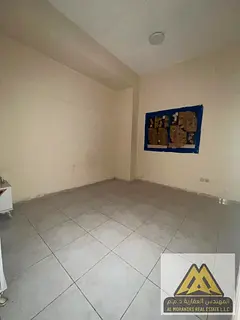 One-bedroom apartment for annual rent in Al Nuaimiya 2, Ajman – Ground floor with a large area