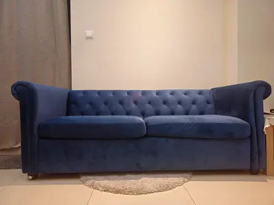 My blue velvet 3-seater Chesterfield-style sofa — good condition
