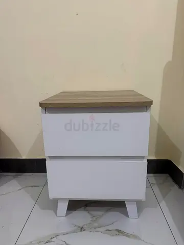 White two-drawer nightstand with wood top 2 items