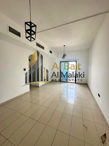 One-bedroom apartment for rent in Al Majaz 3 - Al Qasba | Central air conditioning | Free swimming pool and gym | Free parking