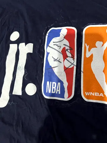 jr nba shirt signed by muggsy bogues