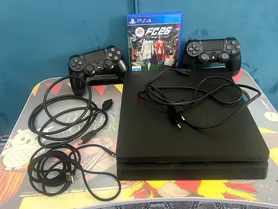 My PS4 Slim with 2 DualShock Controllers + FIFA 26 (All Cables Included)+there when you but the cd