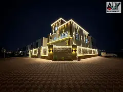 Corner villa for sale in a prime location near Sheikh Mohammed Bin Zayed Road, freehold ownership.