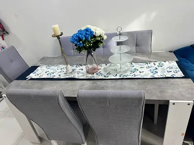 Modern Dining Table with Elegant Chairs.