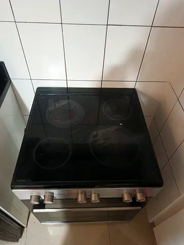 Used Electric Stove with Four places