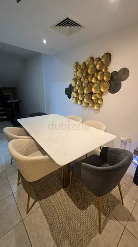 Almost like Brand new Marble-top dining table with 6 new chairs with beautiful fabric Artwork desig