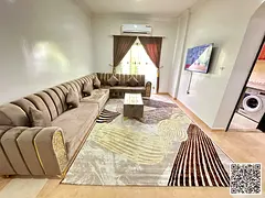 For monthly rent in Ajman, two-bedroom apartment with a balcony open view, fully furnished with eleg