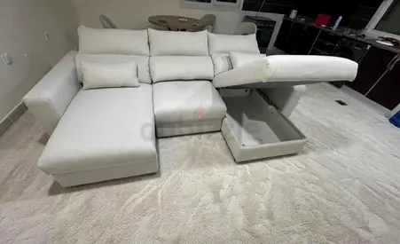 L-Shaped beige Ikea eskilstuna sofa bed