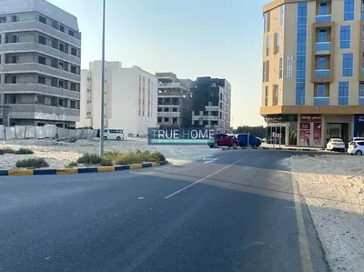 Land for Sale in Muwaileh 7 Floors & Shops